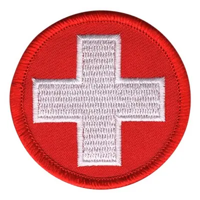 Tygmärke Runt Rött med Vitt Kors